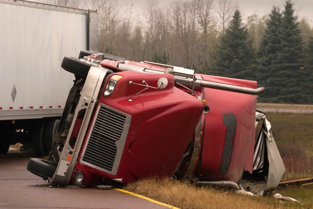 truck knocked over in the wind after driving in wyoming